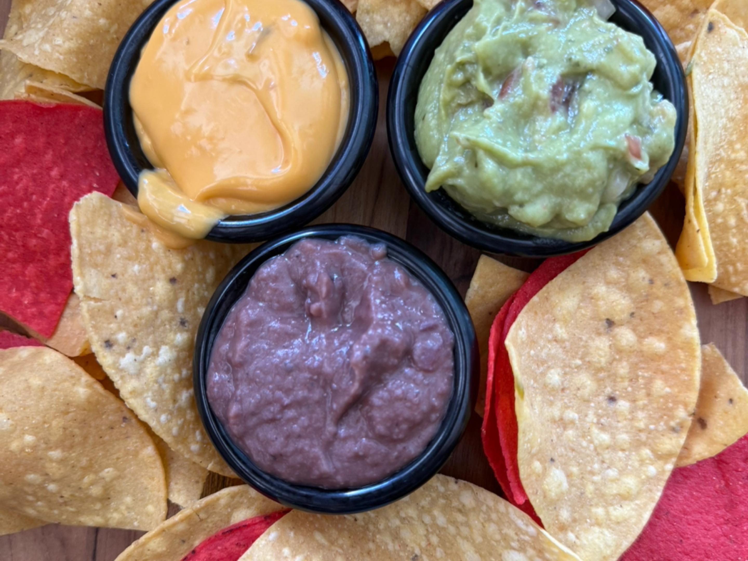 Pep's fiesta dip platter (5oz guacamole, salsa chips, refried beans & cheese dip)