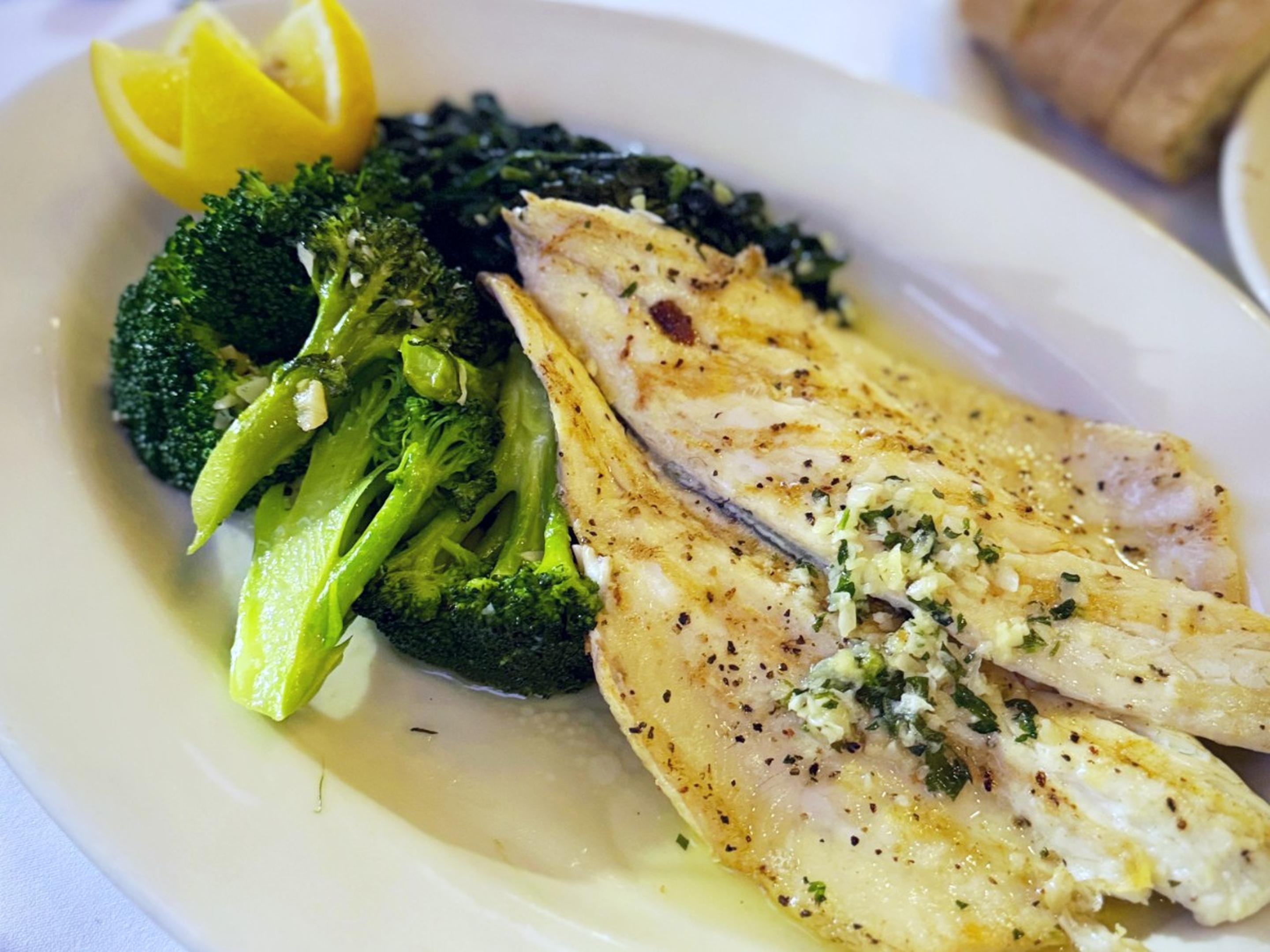 Grilled Branzino With Lemon, Olive Oil And Garlic Sauce