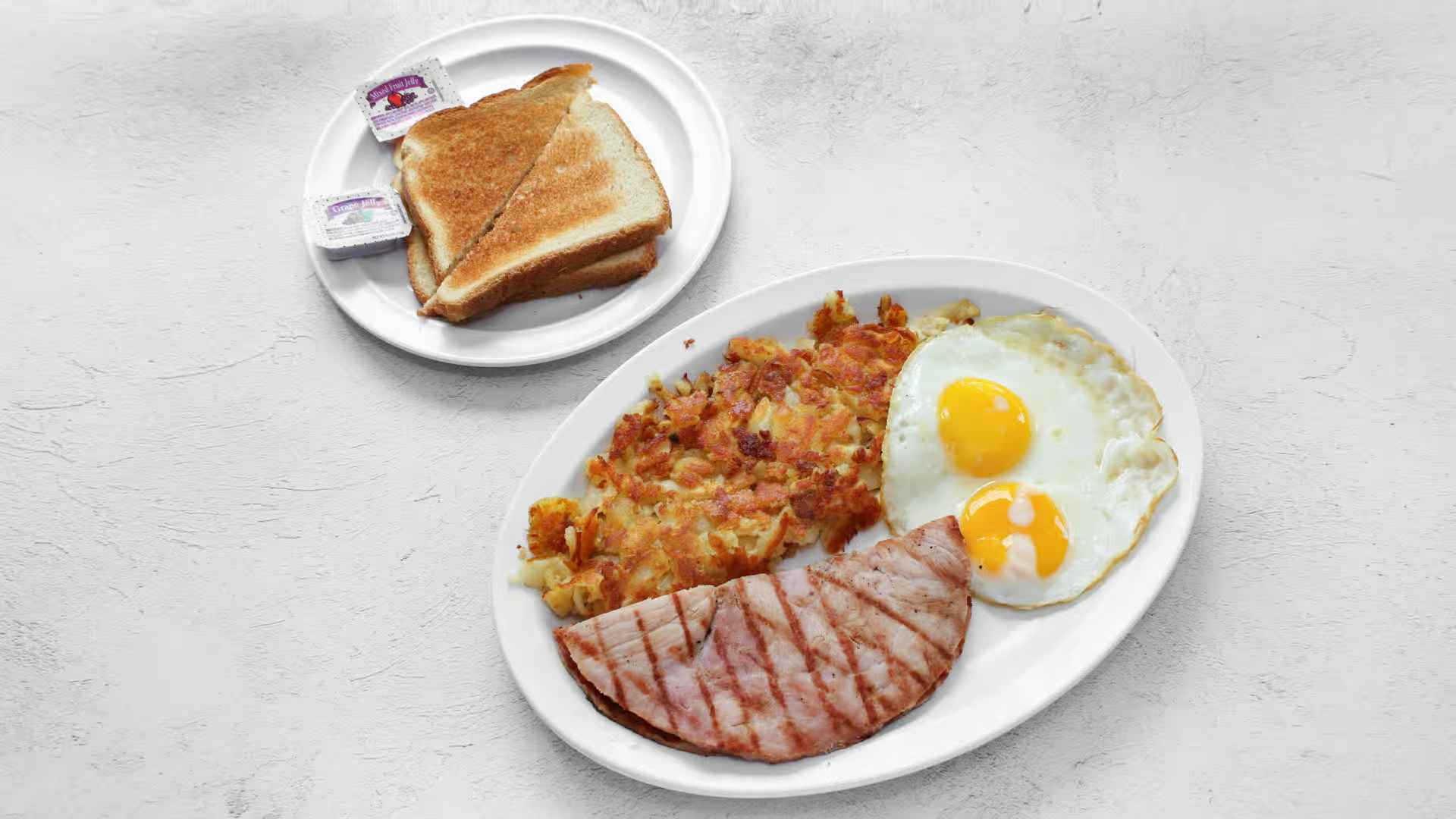 Ham and Eggs - 2 Eggs, Hasbrowns Choice of Toast